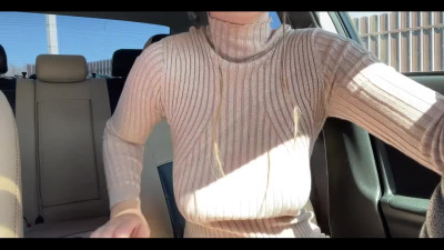 Busty Russian slut intensively caresses her pussy in the car until she gets a public orgasm.