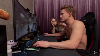 The guy is playing a game, and the slut herself crawled under the table.