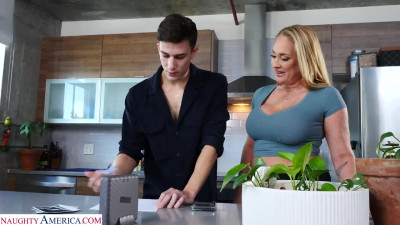 Big tits blonde climbs on her stepson to ride his big cock