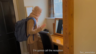 Arab beauty in a hijab sits on her stepsons big dick while sharing a bed with him in a hotel room.