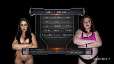 Spectacular struggle of busty milfs ends with the victory of a fat bitch with a strap-on.