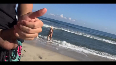 Guy was jerking off at the beach when he got attention of a couple of teen girls
