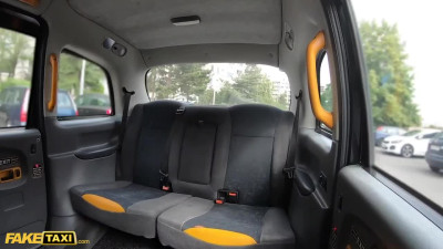 Seductive blonde Florane Russel is getting her pussy fucked on the back seat of a fake taxi