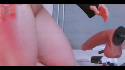 Blonde asian sucks on a big dildo toy
