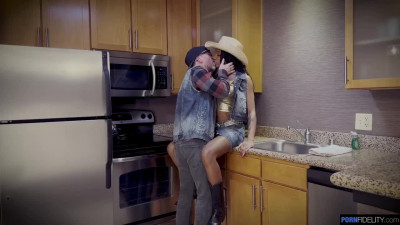 Ebony MILF Lacey London is riding Madison as a real cowgirl on the couch