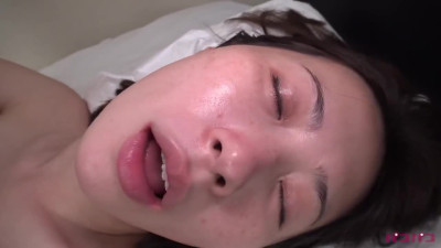 Asian milf gets a taste of a young dick in her bed