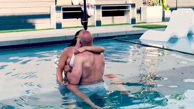 Brunette milf enjoyed fucking in the pool outside