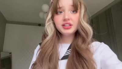 Cute girl in Japanese school uniform thinks of dicks making their moves