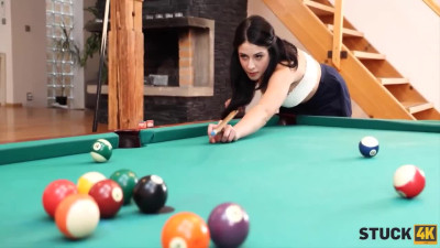 Seductive brunette with a pretty face gets her pussy pounded pretty raw on the pool table