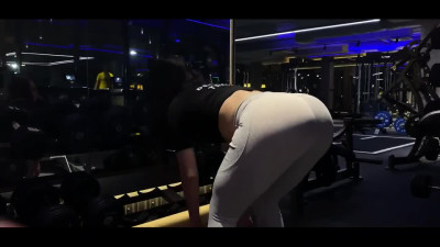 Juicy personal trainer is having a hot fuck with a strong man