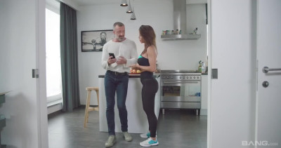 Big boobed MILF Vittoria Divine is getting her pussy and anal fucked in the kitchen