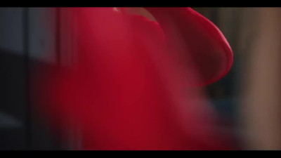 Red-clad beauty Polly Yangs is making her entrance into the heart of a man