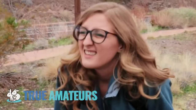 Nerdy babe in glasses does a titjob and blowjob outdoors while hiking