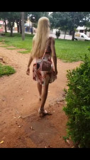 Naughty blonde girlfriend is quite shameless in showing her pussy in public