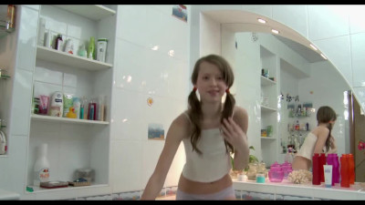 A young slut with small tits decided to retire to the bathroom to get an orgasm.