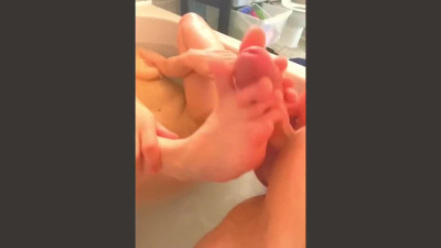 Girl uses her sexy feet to keep his boner as hard as possible