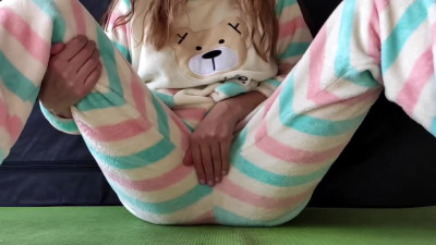 Cute Asian babe in pajamas masturbates her wet pussy