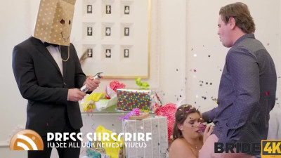Bride gets on her knees for the groom before ceremony
