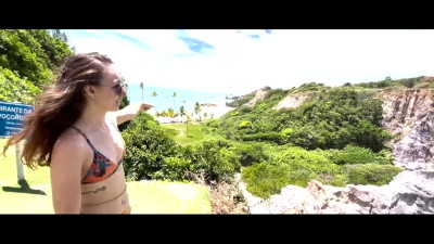 Playful latina blows and rides her man's hard boner on the beach