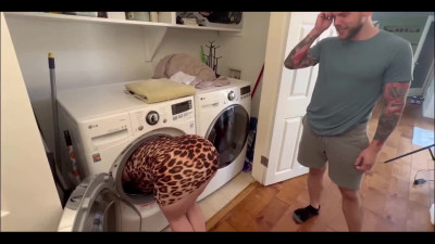 Sexy redhead stepmom is stuck in the washing machine, now she's going to get fucked.