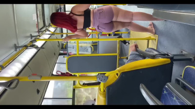 A redhead milf takes a bus ride that ends with a hard handjob