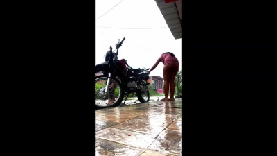 A hot Latina girlfriend has a romantic bang during the rainy weather