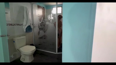 Perved stepbrother watching his slutty big-boobed stepsister having a shower.