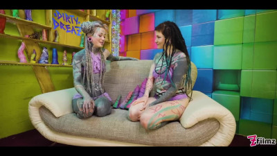 Tattooed lesbians hardcore stretching each other's holes with huge dildos.